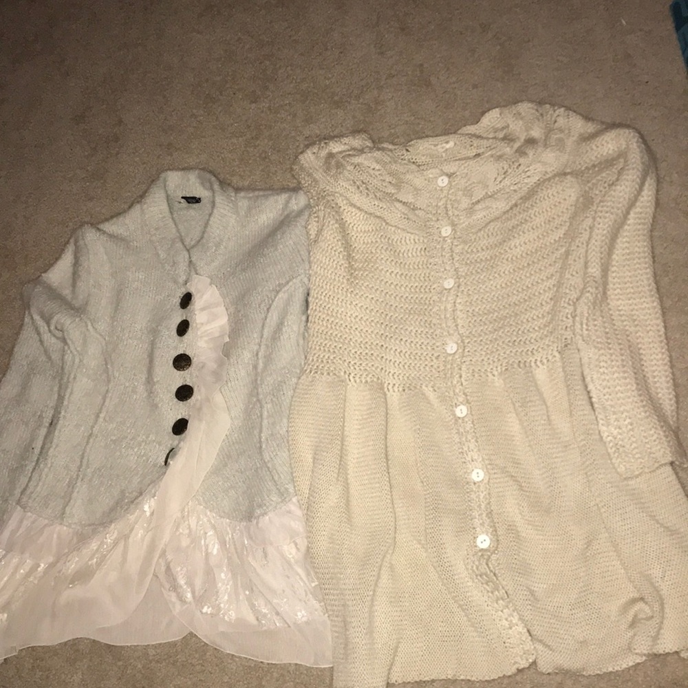 Two pairs of women’s sweaters